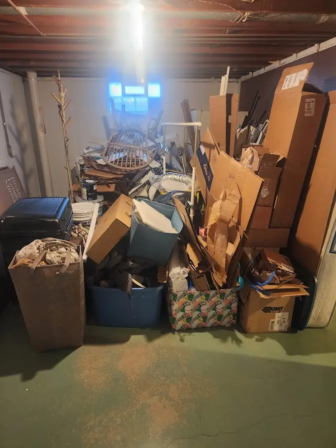 Roll-off dumpster container at job site for 15 Yard Dumpster Rental in DeWitt